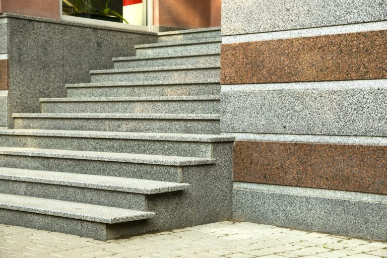 Detail of a house facade. New granite stairs.